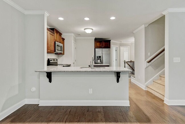 Building Photo - MOVE IN READY! – Gorgeous 4BR/4BA Townhome in Villages of Apex, 1 mile to DT Apex!