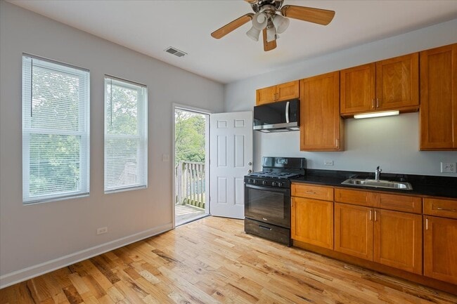 Building Photo - 1234 W 49th Pl