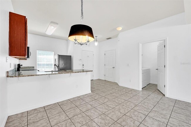 Building Photo - 4569 Ada Ln