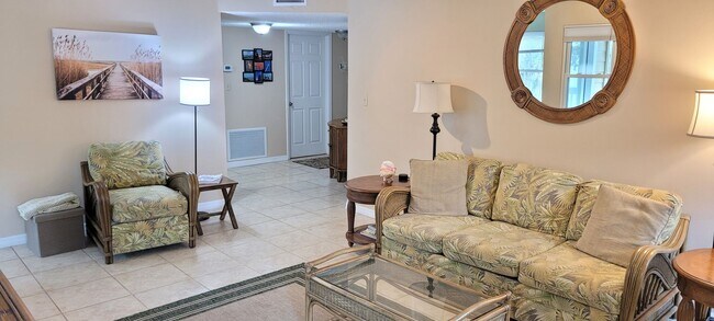 Building Photo - Funished Resort Style Condo in Gated Community- River Front