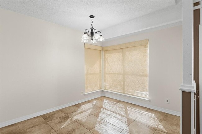 Building Photo - 8403 Sage Mountain Dr