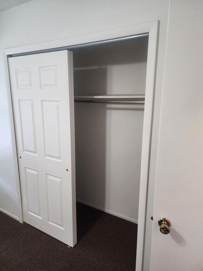 Spare Bedroom closet - 9900 W 21st Ave