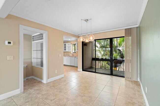 Building Photo - Lakefront lifestyle in this stunning 3-bed...