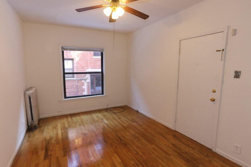 Building Photo - 933 W Sunnyside Ave