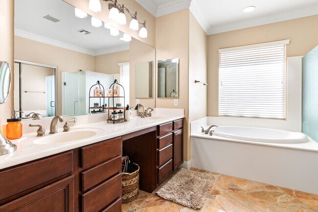 Building Photo - Spacious Mountain’s Edge Home with Den, Sunroom, 3-Car Garage & Private Spa Retreat