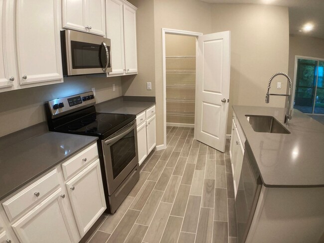 Building Photo - Your Private Escape with High-End Finishes...