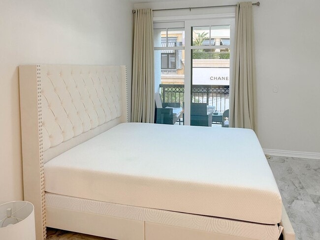 Building Photo - Experience Elevated Living at The American...