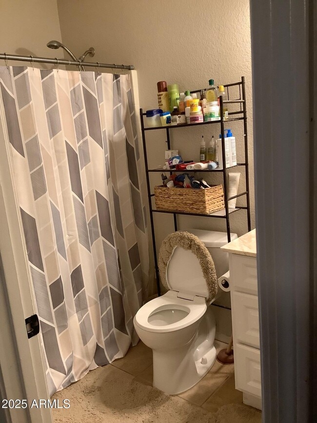 Building Photo - 10432 W Granada Rd