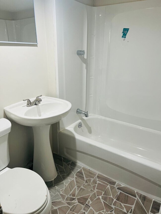 Building Photo - Newly remodeled home with 2nd kitchen in the basement