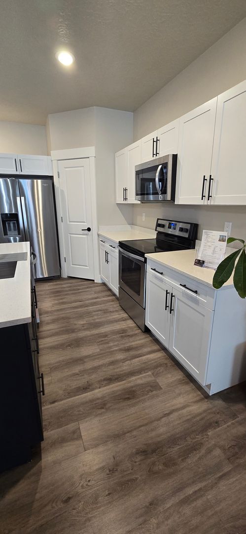 Building Photo - Come check out this beautiful 3 story town...