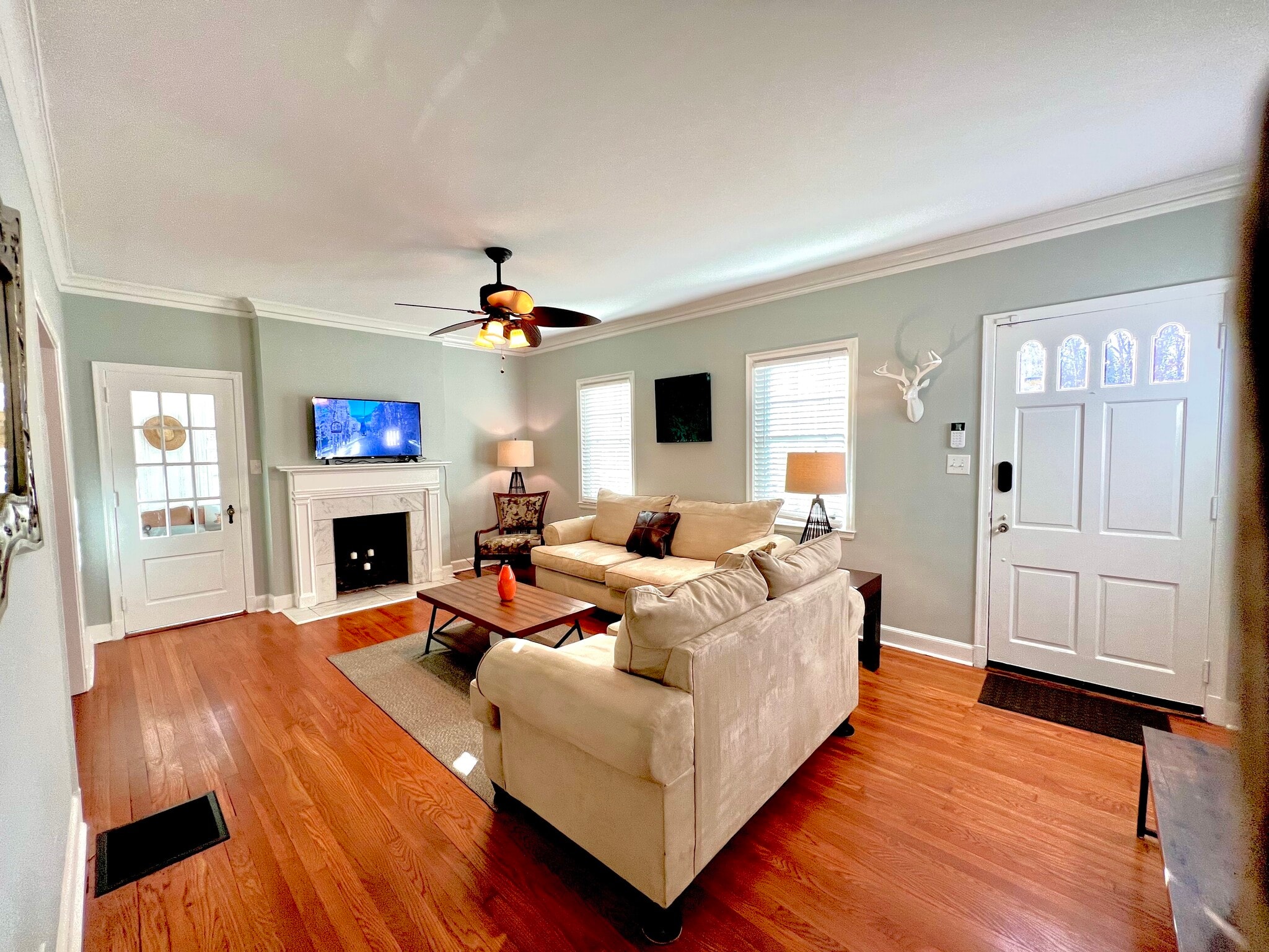 Living room. Door to office visible - 2506 E Woodland Cir