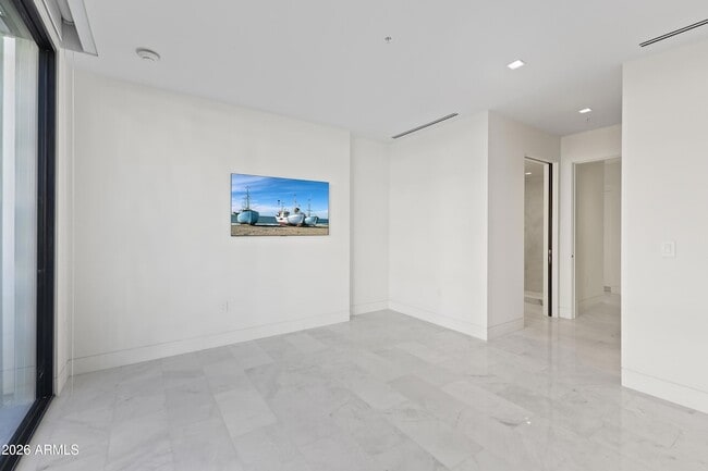 Building Photo - 6587 N Palmeraie Blvd