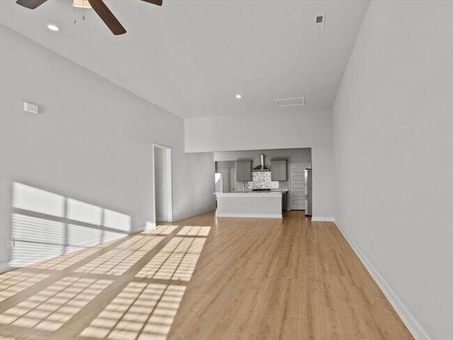 Building Photo - 3 Car Garage! Modern end-unit townhome located in the desirable Clift Farm!