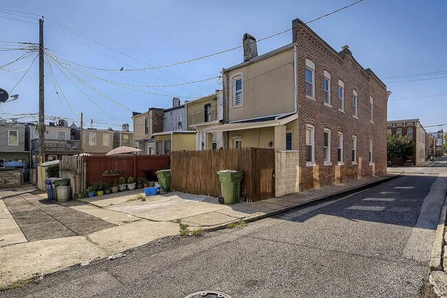 Building Photo - Charming 3 Bedroom/2.5 Bathroom Townhome in Patterson Park with Parking Pad!