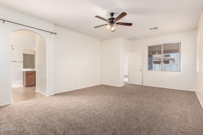Building Photo - 9883 W Harmony Ln