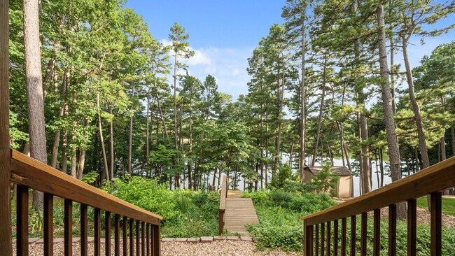 Building Photo - Serene Bella Vista Lakeside 4 bedroom