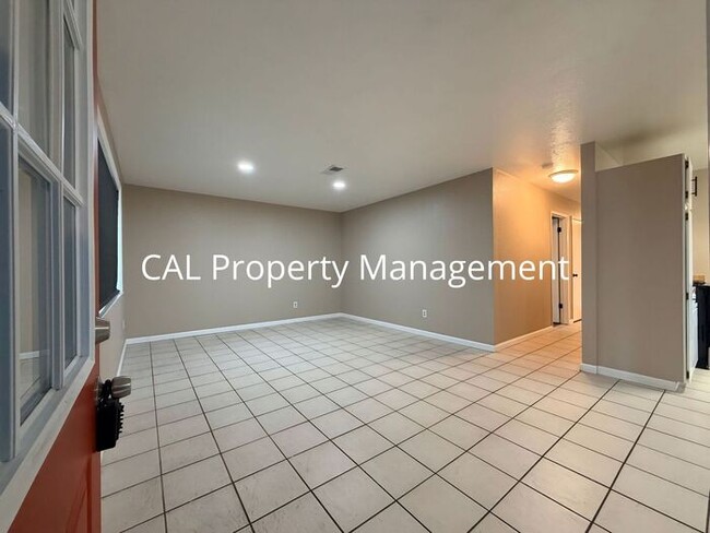Building Photo - Spacious 4-Bedroom Home with 2-Car Garage & Backyard Oasis