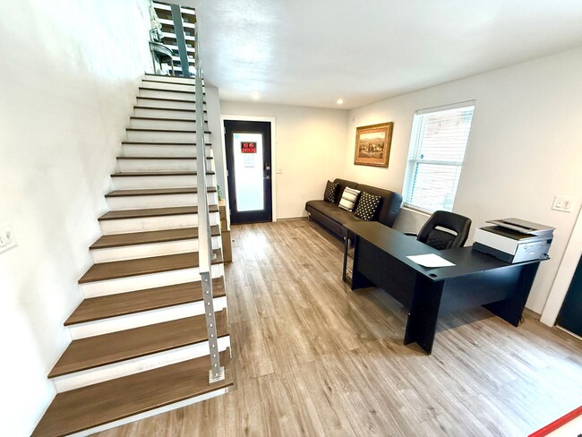 Building Photo - AVAILABLE NOW! Jaw Dropping 3 Story 3 Bedr...