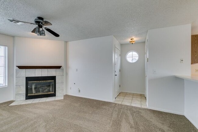 Building Photo - Charming Second-Floor Condo with Two Bedrooms and Fireplace