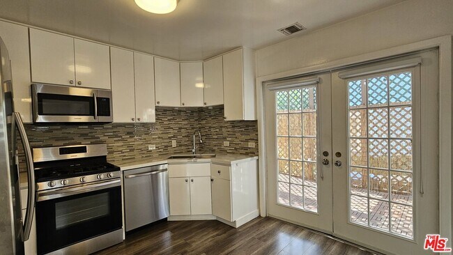 Building Photo - 1209 N Genesee Ave