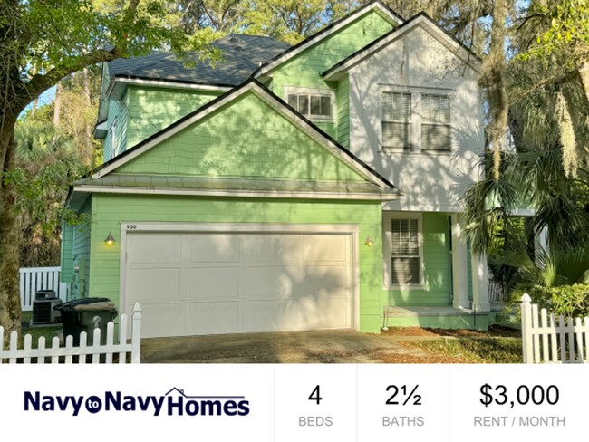 Building Photo - Coastal Charm: Luxurious 4-Bedroom Home in...