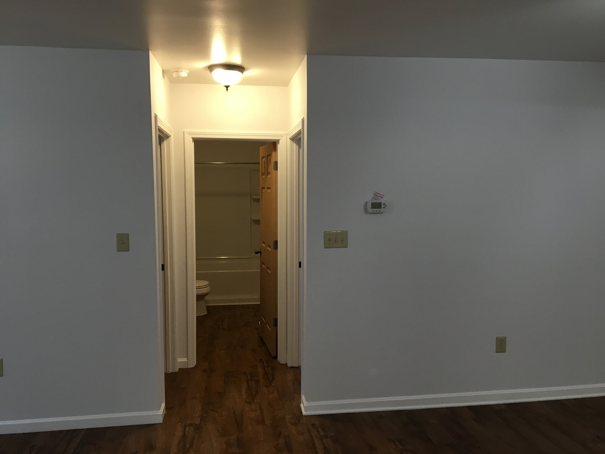 Front room looking at Bathroom 1 and bedrooms - 211 Ecton Rd