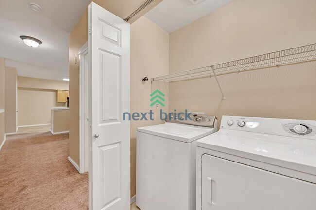 Building Photo - Rare Ground-Floor, End Unit with massive b...