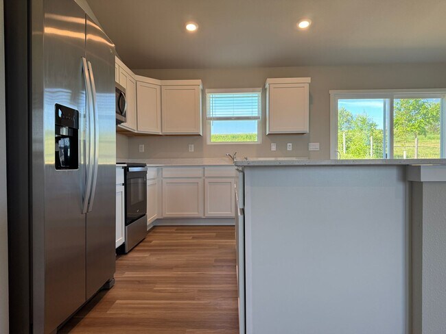 Building Photo - Spacious 4-Bedroom Split-Level Near Standing Bear Lake & Trails