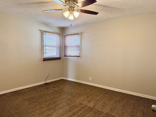 Building Photo - Charming 2-Bedroom Home with Large Backyard!