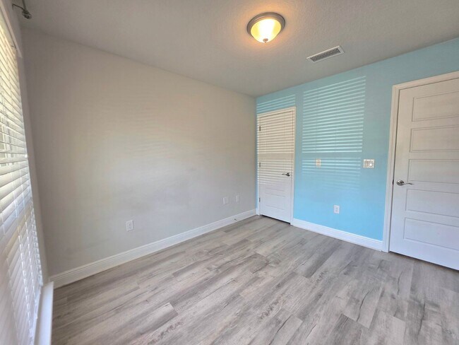 Building Photo - Bright, Open Layout | Screened Porch + Paver Patio | Move-In Ready