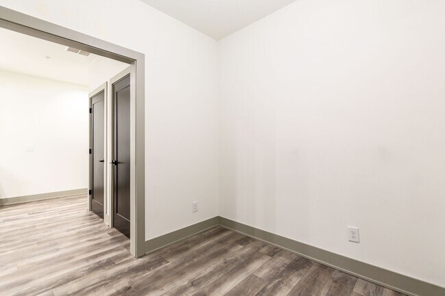 Building Photo - Modern Living Meets Walkable City Charm in...