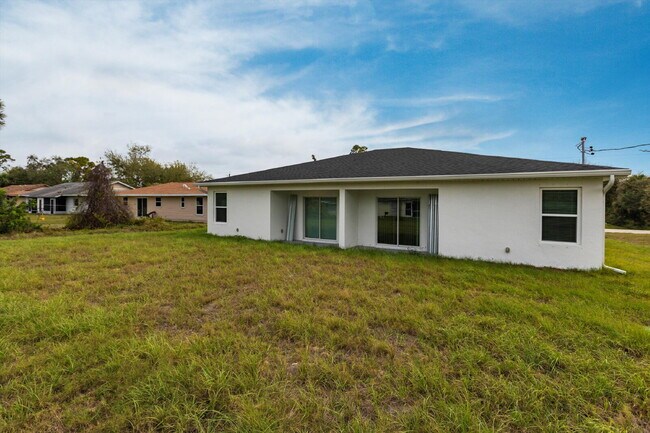 Building Photo - BRAND NEW Construction, 3 bed / 2 bath Rent-Ready Home in Port Charlotte!