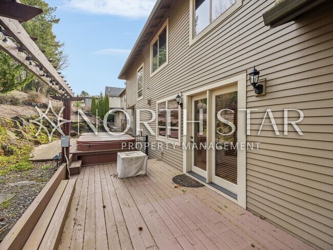 Building Photo - Elevated Forest Heights Retreat with Stunning Valley Views & Versatile Living Spaces