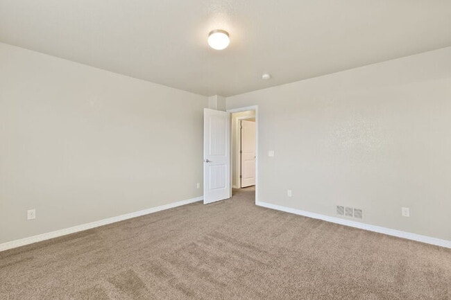 Building Photo - Spacious 3-Bedroom Home with Central A/C Near Fort Carson & Peterson