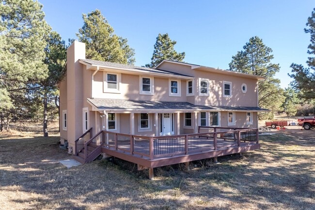 Building Photo - Spacious Country Retreat on 5.5 Acres | Barn, Deck & Pikes Peak View!!