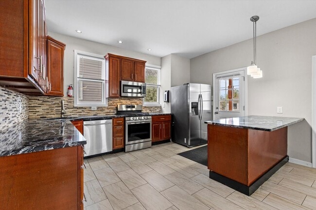 Building Photo - 6BR / 5BA Single-Family Home | 2,663 Sq Ft | Private Driveway | Deck | $4,200/mo Spacious 6-bedro...