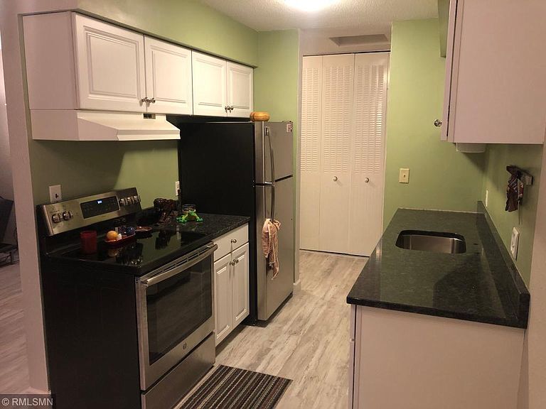 Brand new luxury vinyl flooring and granite counter tops! - 7414 W 22nd St