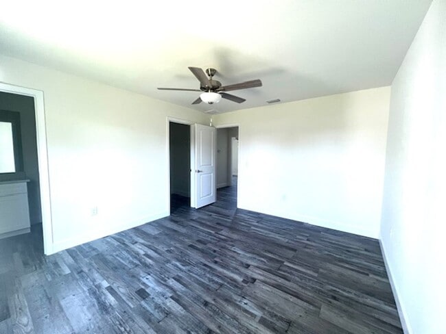 Building Photo - Available Now!! NW CAPE CORAL - 4 Bedrooms - 3 Bathrooms - 2 Car Garage