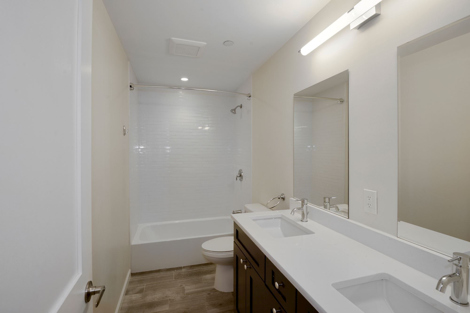Bathroom w/ Double Sink Vanity, Quartz Countertops, Subway Tiles and Plenty of Under Sink Storage! - 1892 Ontario Pl NW