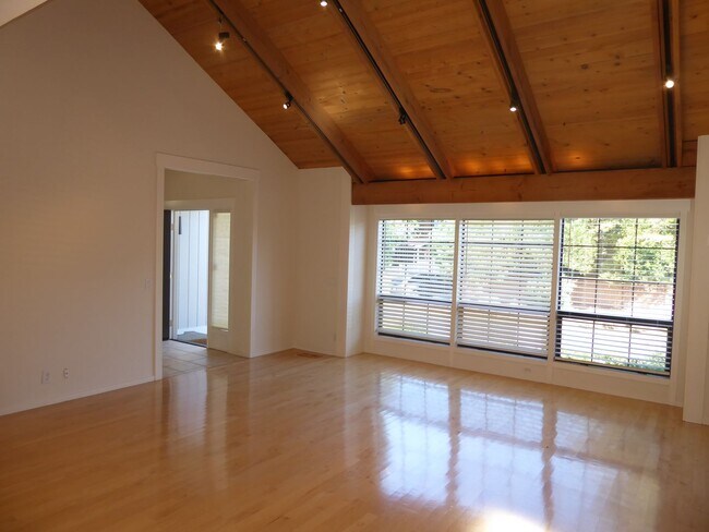 Building Photo - SPACIOUS FOUR BEDROOM / THREE AND HALF BAT...