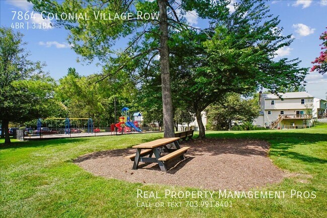 Building Photo - 7864 Colonial Village Row
