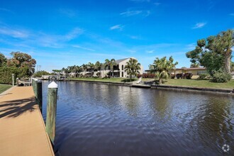 Building Photo - Furnished Gulf Access Canal Condo 2 bed wi...