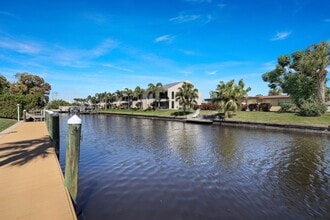 Building Photo - Furnished Gulf Access Canal Condo 2 bed wi...