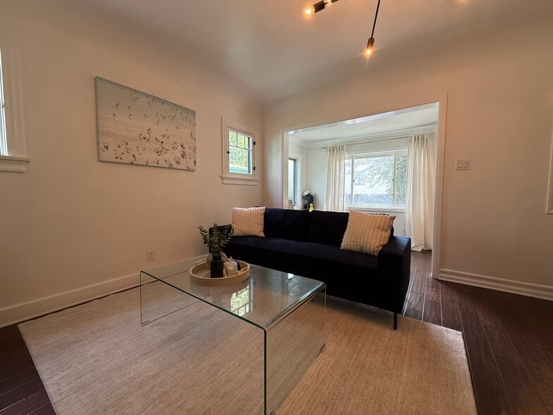 Building Photo - 7865 Willoughby Ave