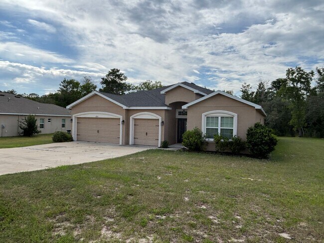 Building Photo - 4 bedroom / 3 bath in great neighborhood - WON'T LAST!