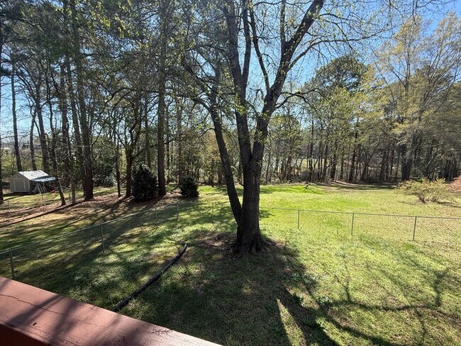 Building Photo - Spacious ranch, fenced yard, 2 car garage, large basement, near Wake Tech