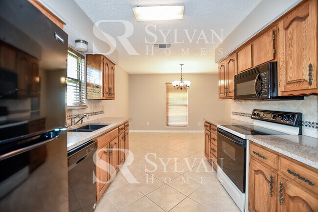 Building Photo - Enjoy living the good life in this 3 bedroom, 2 bathroom brick home