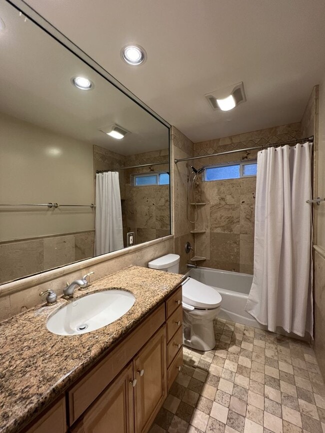 Building Photo - 2,280 Square Foot modern Three bedroom two bath multi  level home, large yard, decks, cathedral c...