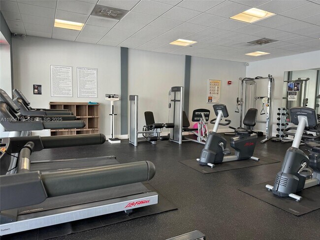 Building Photo - 3675 N Country Club Dr