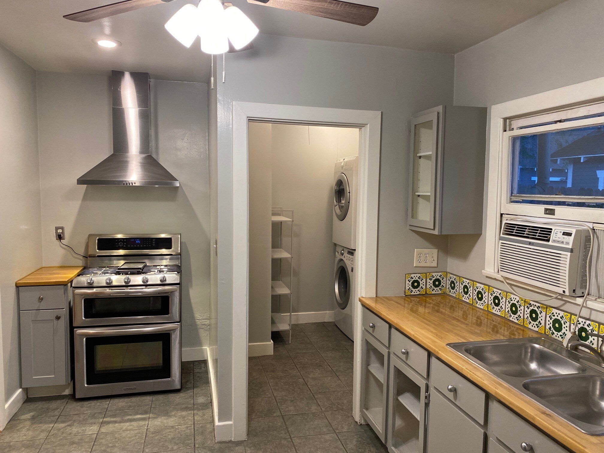 Bright kitchen, Stainless steel appliances, and wood counters - 1355 E Elizabeth St